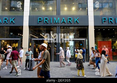 Brussels, Belgium. 13th July, 2022. People walk down in commercial ...