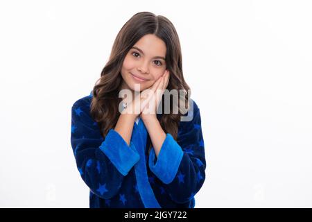 Happy girl face, positive and smiling emotions. Cute young teenager girl against a isolated background. Studio portrait of pretty beautiful child. Stock Photo