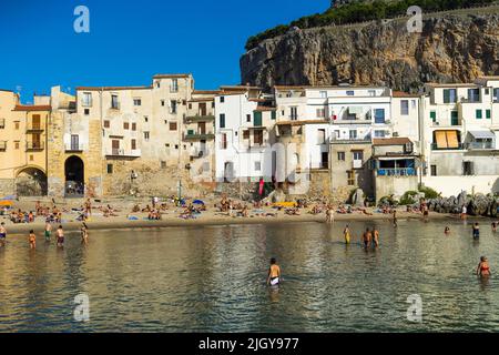 The beach at Cefalu on a sunny day Stock Photo