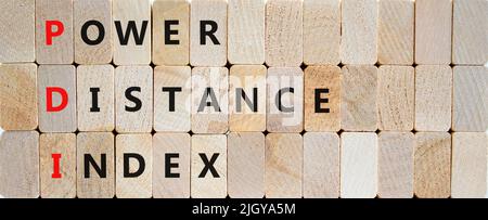 PDI power distance index symbol. Concept words PDI power distance index on wooden blocks on a beautiful wooden background. Business PDI power distance Stock Photo