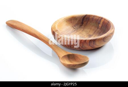 empty wooden bowl and spoon isolated on white background Stock Photo