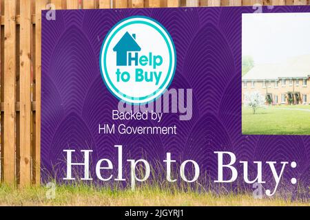 Help to Buy Scheme sign on new building estate - UK Stock Photo