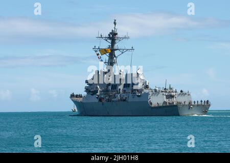 PEARL HARBOR (July 11, 2022) – Arleigh Burke-class guided-missile destroyer USS Spruance (DDG 111) departs Pearl Harbor to begin the at-sea phase of Rim of the Pacific (RIMPAC) 2022, July 11. Twenty-six nations, 38 ships, four submarines, more than 170 aircraft and 25,000 personnel are participating in RIMPAC from June 29 to Aug. 4 in and around the Hawaiian Islands and Southern California. The world’s largest international maritime exercise, RIMPAC provides a unique training opportunity while fostering and sustaining cooperative relationships among participants critical to ensuring the safety Stock Photo