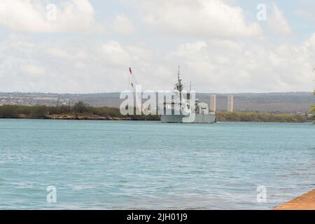 PEARL HARBOR (July 11, 2022) Royal Canadian Navy frigate HMCS Winnipeg (FFH 338) departs Pearl Harbor to begin the at-sea phase of Rim of the Pacific (RIMPAC) 2022, July 11. Twenty-six nations, 38 ships, four submarines, more than 170 aircraft and 25,000 personnel are participating in RIMPAC from June 29 to Aug. 4 in and around the Hawaiian Islands and Southern California. The world's largest international maritime exercise, RIMPAC provides a unique training opportunity while fostering and sustaining cooperative relationships among participants critical to ensuring the safety of sea lanes and Stock Photo