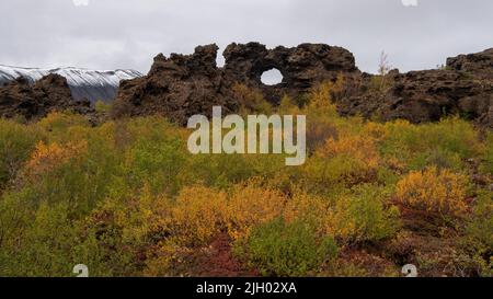 The Dimmuborgir area is composed of various volcanic caves and rock formations, reminiscent of an ancient collapsed citadel (hence the name). Stock Photo