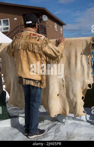 Vintage Dene traditional tanned moosehide jacket embroidered with flowers, in the northern Indigenous community of Deline, Northwest Territories, Cana Stock Photo