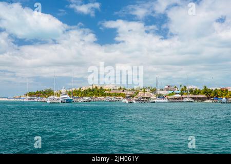 Port with sailboats and ships in Isla Mujeres island in Caribbean Sea, Cancun, Yucatan, Mexico. Stock Photo