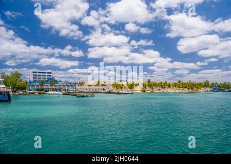 Port with sailboats and ships in Isla Mujeres island in Caribbean Sea, Cancun, Yucatan, Mexico. Stock Photo