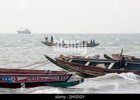 PORTUGUESE TOWN, BANJUL, THE GAMBIA - FEBRUARY 10, 2022 local ferry boat leaving Stock Photo