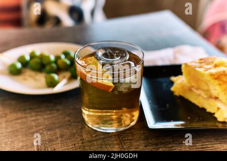 Spanish pincho based on must, olives and egg and potato omelette Stock Photo