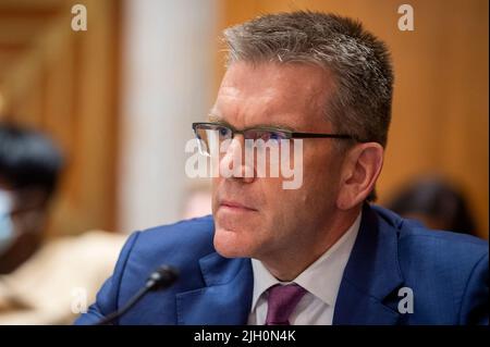 Dean R. Thompson appears before a Senate Committee on Foreign Relations ...