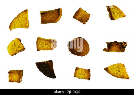 Homemade bread crumbs on a white background. Slices of toasted bread. Food, ingredients. Stock Photo