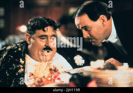 JONES,CLEESE, MONTY PYTHON'S THE MEANING OF LIFE, 1983 Stock Photo