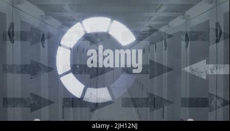 Image of loading ring over arrows and server room Stock Photo