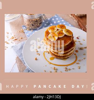 Image of pancakes with bananas on plate over pink background Stock Photo