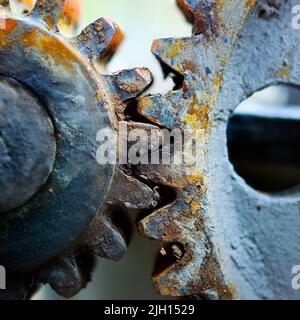 rusty mechanical gear stack in a garage Stock Photo