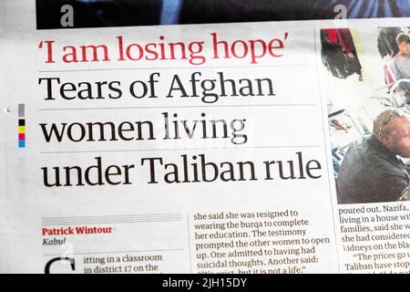 'I am losing hope' 'Tears of Afghan women living under Taliban rule' Guardian newspaper Afghanistan article 2022 London UK Stock Photo