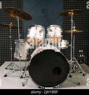 Drum set on stage prepared for playing. Stock Photo