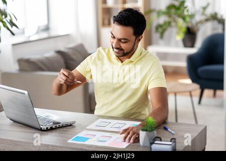 ui designer working on user interface at home Stock Photo