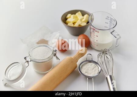 ingredients and tools for food cooking on table Stock Photo