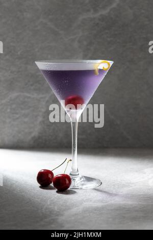 Classic aviation cocktail on gray stone background Stock Photo