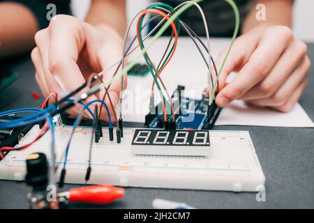 Breadboard with cables close-up Stock Photo