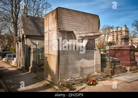 PARIS, FRANCE -APRIL 4, 2018: The tomb of Oscar Wilde in Pere Lachaise Cemetery Stock Photo