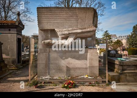 PARIS, FRANCE -APRIL 4, 2018: The tomb of Oscar Wilde in Pere Lachaise Cemetery Stock Photo