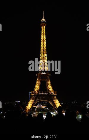 PARIS, FRANCE -APRIL 7, 2018:  The Eiffel Tower is the most famous landmark of the city Stock Photo