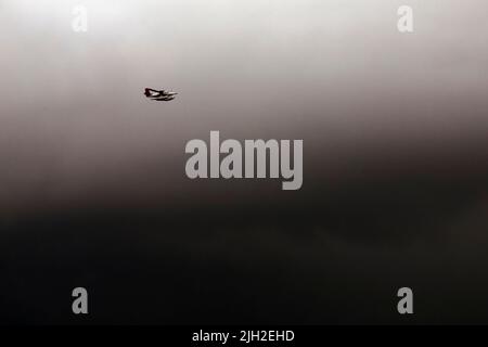 Hydroplane in dark sky, Maldives Stock Photo