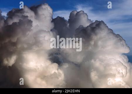 Hydroplane in sky, Cloudy scape Stock Photo