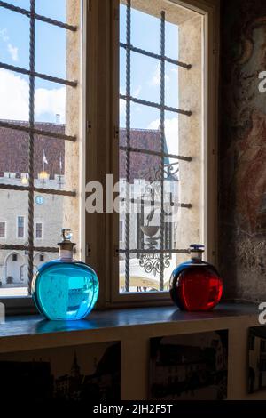 Glass bottles on the window, in an old pharmacy in Tallinn Stock Photo