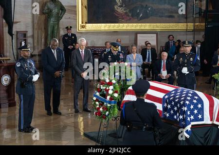US Secretary of Defense Lloyd Austin (L) and Secretary of Veterans Affairs Denis McDonough (C), and US Chairman of the Joint Chiefs of Staff, General Mark Milley (R) pay their respects to Marine Chief Warrant Officer 4 Hershel Woodrow “Woody” Williams, the last surviving World War II Medal of Honor recipient, who lies in honor in the Rotunda of the US Capitol, in Washington, DC, USA, 14 July 2022. The Marine Corps veteran, who died June 29th, was awarded the nation's highest award for his actions on Iwo Jima. (Photo by Pool/Sipa USA) Stock Photo