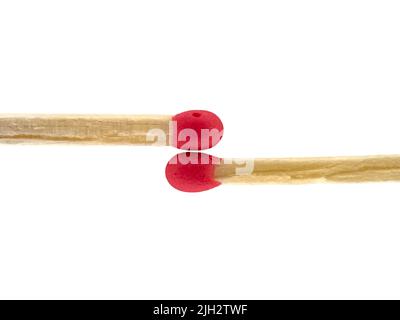 Two red-headed matches, isolated on white Stock Photo