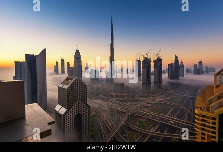 Beautiful view of Dubai skyline during morning fog in the winter, United Arab Emirates Stock Photo