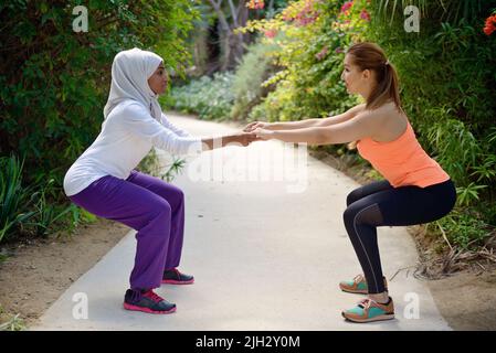 Young women working out in outdoor, Dubai, United Arab Emirates Stock Photo