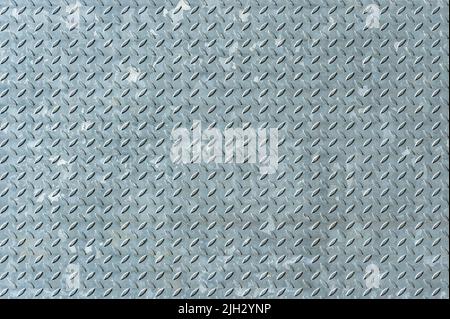 Industrial metal checker plate, metal checker plate texture background Stock Photo