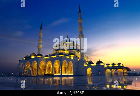 Beautiful view of Sharjah Grand Mosque in the evening, United Arab Emirates Stock Photo