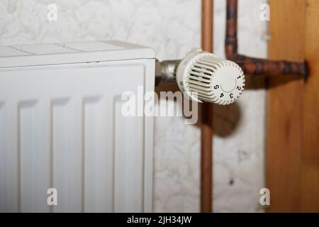 radiators with thermostat and old copper pipes, a heating system Stock ...