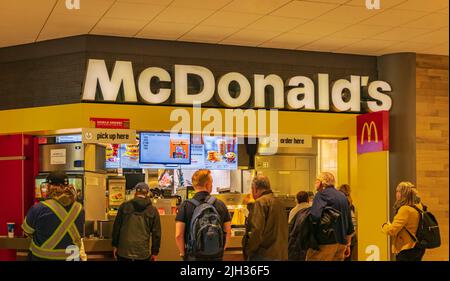 Interior of McDonald's restaurant. McDonald's is the world's largest chain of hamburger fast food restaurants, founded in the United States-July 10,20 Stock Photo