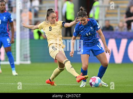 Rotherham, UK. 14th July, 2022. Belgium's Tessa Wullaert and France's Charlotte Bilbault fight for the ball during a game between Belgium's national women's soccer team the Red Flames and France, in Rotherham, England on Thursday 14 July 2022, second game in the group D at the Women's Euro 2022 tournament. The 2022 UEFA European Women's Football Championship is taking place from 6 to 31 July. BELGA PHOTO DAVID CATRY Credit: Belga News Agency/Alamy Live News Stock Photo