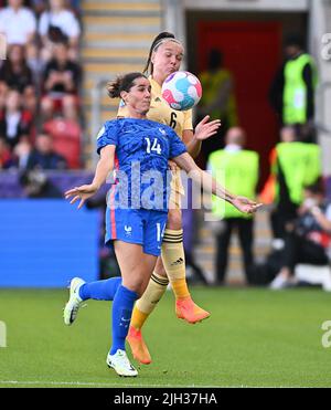 Rotherham, UK. 14th July, 2022. France's Charlotte Bilbault and Belgium's Tine De Caigny fight for the ball during a game between Belgium's national women's soccer team the Red Flames and France, in Rotherham, England on Thursday 14 July 2022, second game in the group D at the Women's Euro 2022 tournament. The 2022 UEFA European Women's Football Championship is taking place from 6 to 31 July. BELGA PHOTO DAVID CATRY Credit: Belga News Agency/Alamy Live News Stock Photo