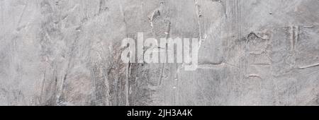 gray textured background created from putty. Web banner Stock Photo