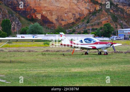 Red and white small airplane outdoor Stock Photo