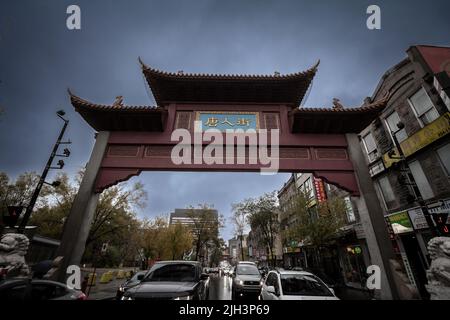 Picture of the paifang at the entrance of Chinatown in Montreal, Quebec. Chinatown in Montreal is located in the area of De la Gauchetière Street in M Stock Photo