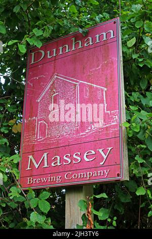 The Dunham Massey Brewing Company sign at entrance, Dunham village, Bowden, Altrincham, Cheshire, England, UK, WA14 4PE Stock Photo