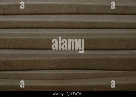 Beige and brown bath tiles lines texture. Stock Photo