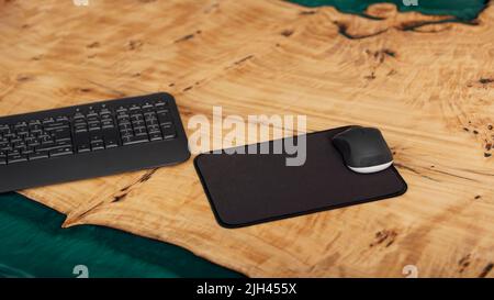 computer keyboard and mouse on wooden table. concept of remote work, freelance Stock Photo