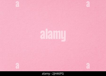Smooth pink paper cardboard as texture, background, top view space for text Stock Photo