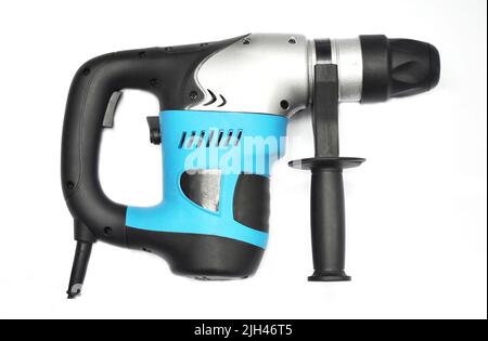 An electric hammer drill, a heavy duty rotary hammer drill with a chisel function isolated on a white background. Stock Photo
